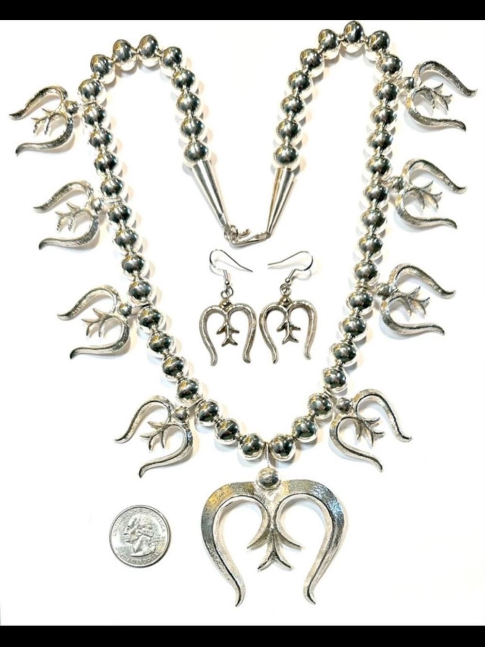 Stunning heavy sterling silver necklace and earrings set by Navajo artist